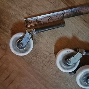 Four pieces porcelain wheels with metal posts